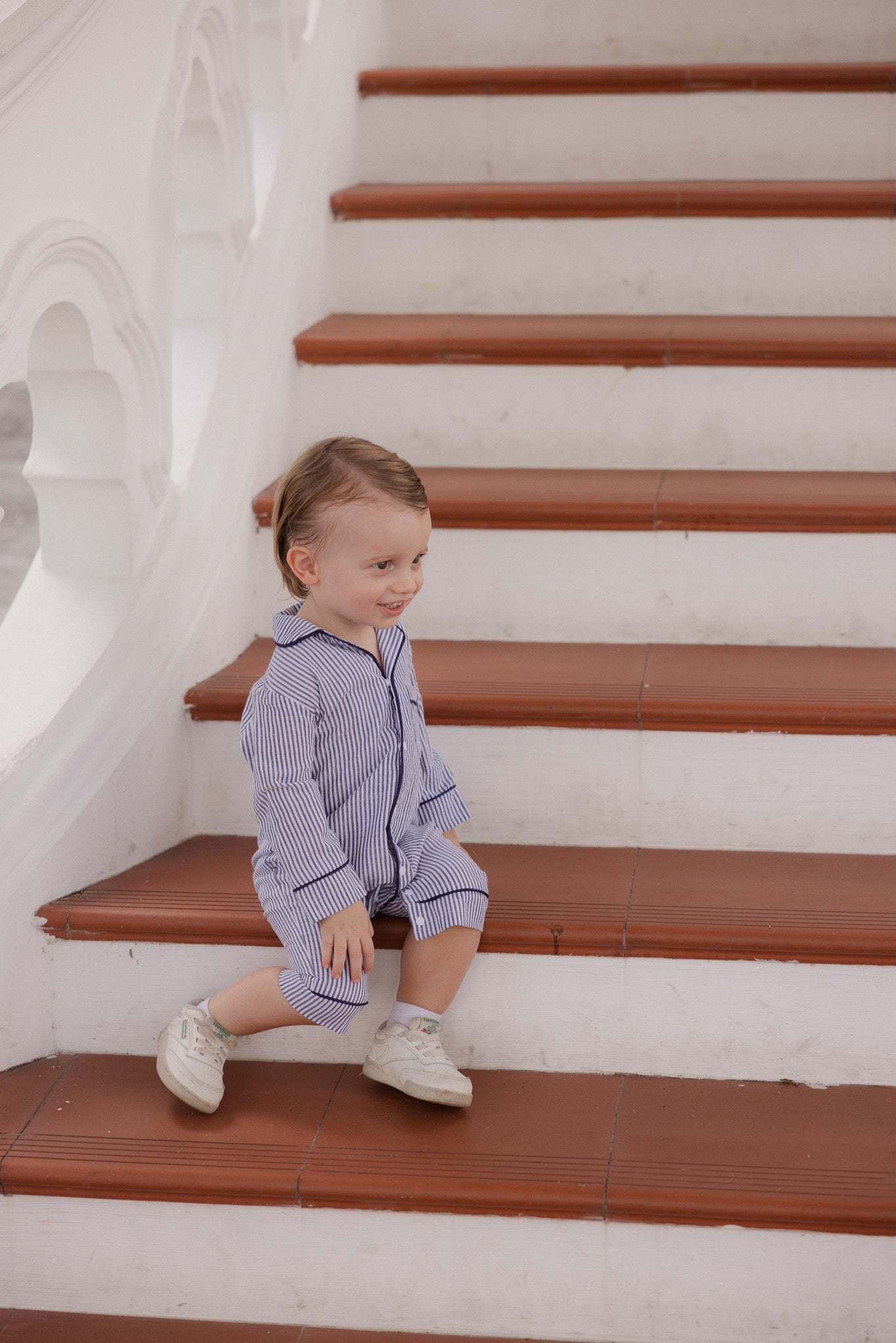 The Jubilee Baby Pajama Romper in Navy