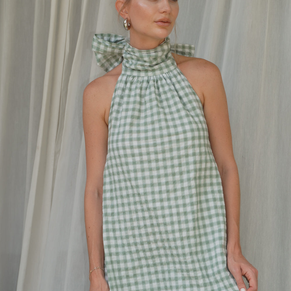 
                  
                    Audrey Bow Halter Maxi Dress in Gingham
                  
                