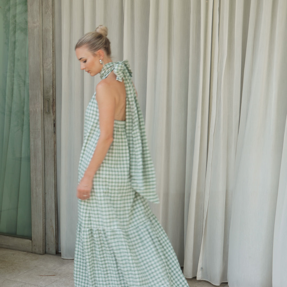 
                  
                    Audrey Bow Halter Maxi Dress in Gingham
                  
                