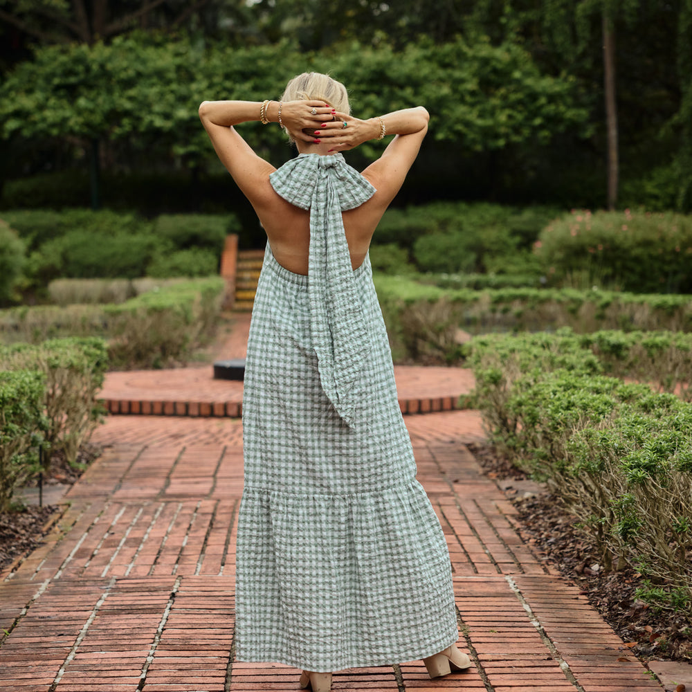 
                  
                    Audrey Bow Halter Maxi Dress in Gingham
                  
                